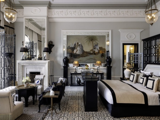 Stylish bedroom featuring classic furnishings and decor.