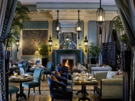 Sophisticated restaurant interior with cozy seating and warm tones.