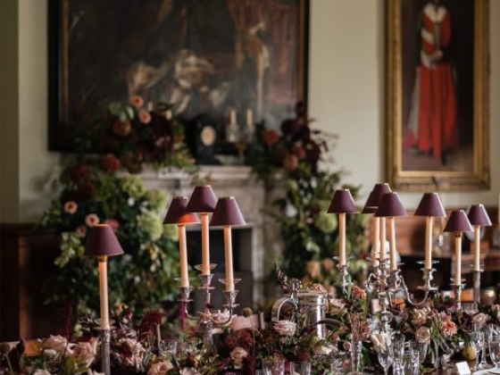 Luxurious table setting with art and decorations.