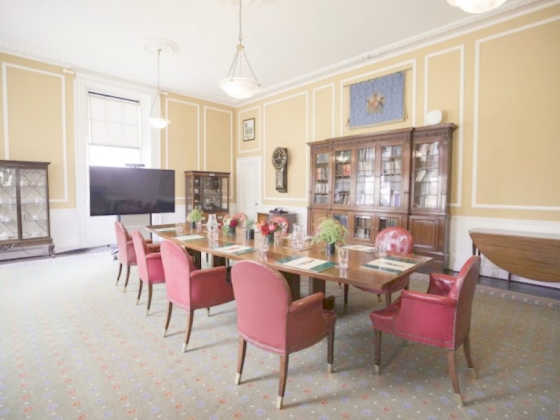 A stylish room equipped for meetings and discussions.