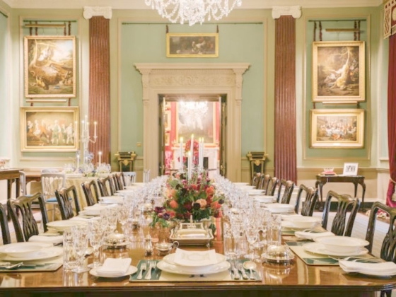 A beautifully arranged table in a historic setting.