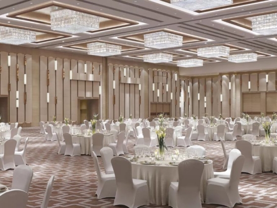 Spacious event space set for a formal gathering.