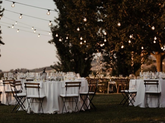 rustic and white wedding tables under lights