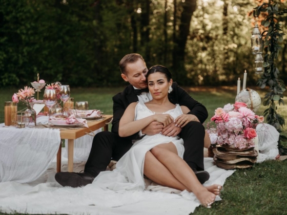 Intimate moment between a couple in a serene garden.