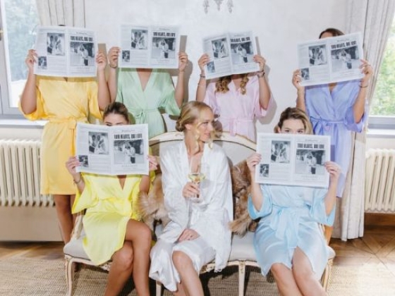 A group of bridesmaids enjoying a playful moment together.