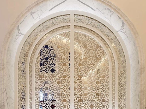 Decorative window design with floral motifs.