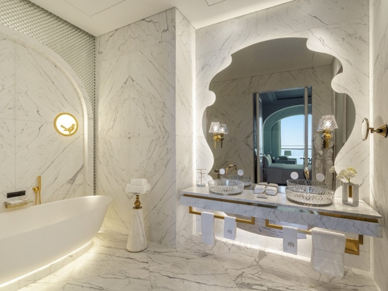 Sophisticated interior featuring a soaking tub and double sinks.