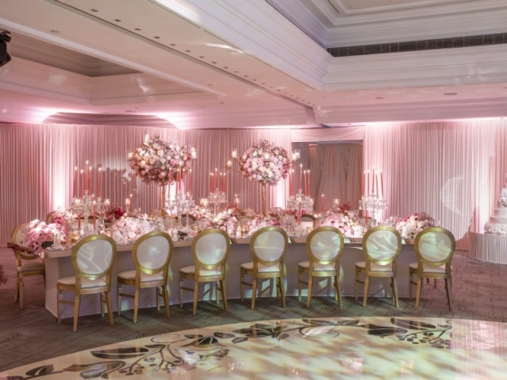 A beautifully arranged dining area for a formal event.
