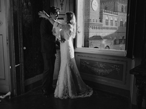 A romantic moment captured between a bride and groom.