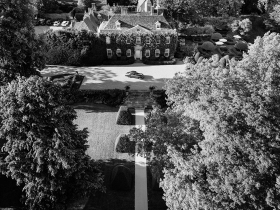 A beautiful estate surrounded by lush greenery.