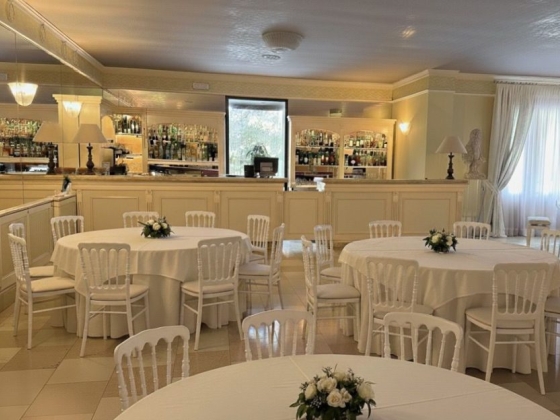 A spacious, well-decorated restaurant interior.