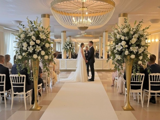 A couple exchanging vows during their wedding ceremony.