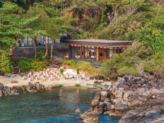 Group of people enjoying a beachside setting.