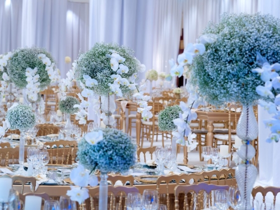 Beautifully decorated tables with flowers and candles.