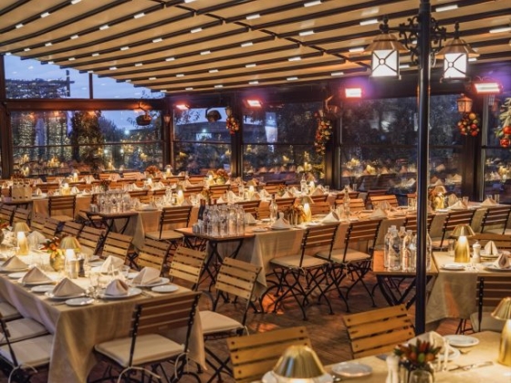 Charming dining area ready for guests with warm ambiance.