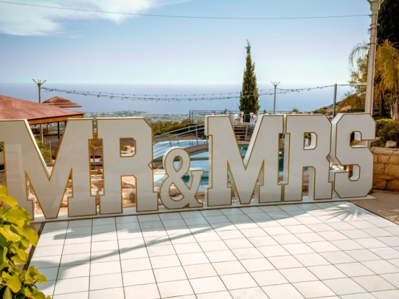 Elegant wedding setup featuring 'MR & MRS' signage.