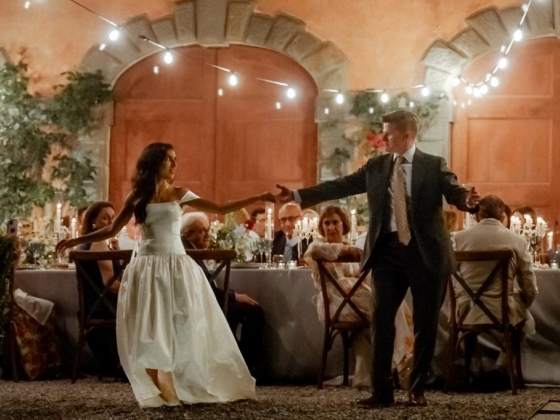 An elegant outdoor celebration with guests enjoying the moment.