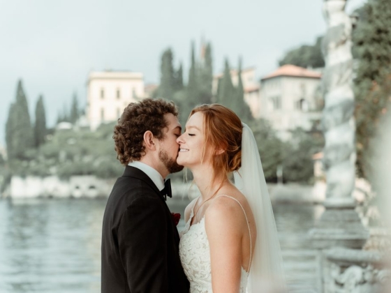 A couple embraces happily on their wedding day.