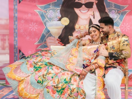 Celebrating love and tradition with a joyful pose.