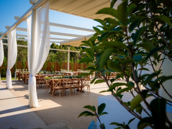 Serene venue set for an outdoor gathering or event.