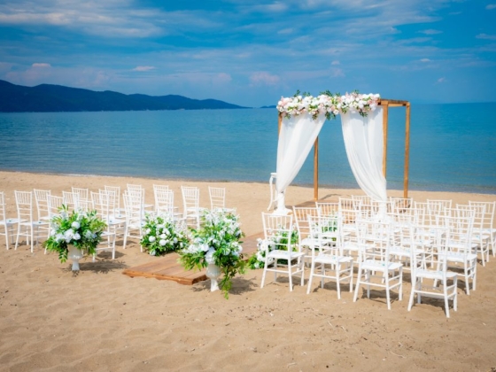A serene beachfront wedding ceremony arrangement.
