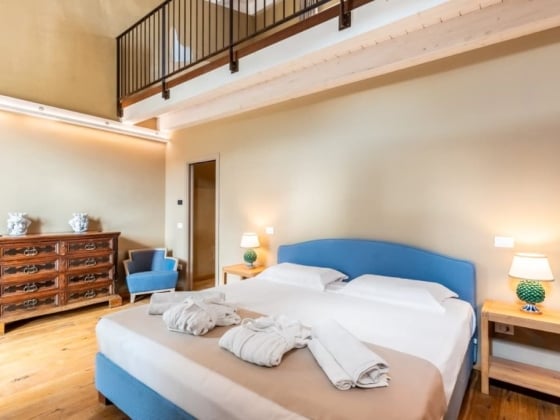Bright, stylish bedroom with cozy furnishings.