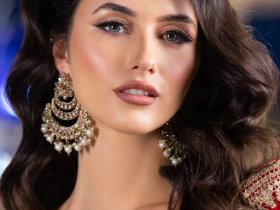 Elegant woman showcasing rich cultural attire and accessories.