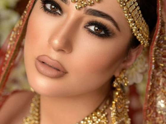 Elegant close-up of a woman in traditional bridal attire.