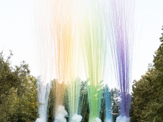 A festive display of rainbow smoke and smoke effects.