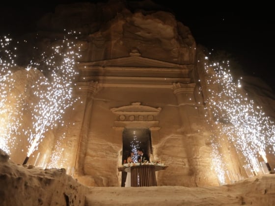 Couple celebrates marriage at Petra's iconic facade.