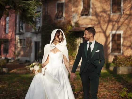 A couple enjoying a romantic moment outdoors.