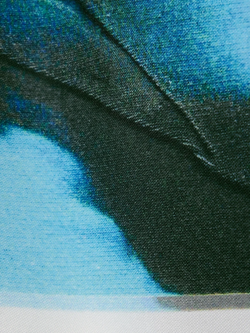 Close-up detail of the 16Arlington Delta Printed Crepe Mini Skirt