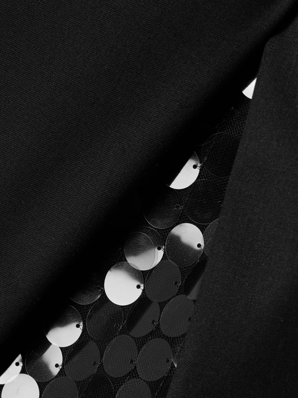 Close-up detail of the 16Arlington Noelia Twill and Paillette-embellished Tulle Mini Wrap Skirt