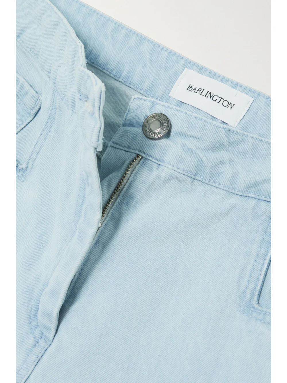 Close-up detail of the 16Arlington Sybil High-rise Flared Jeans