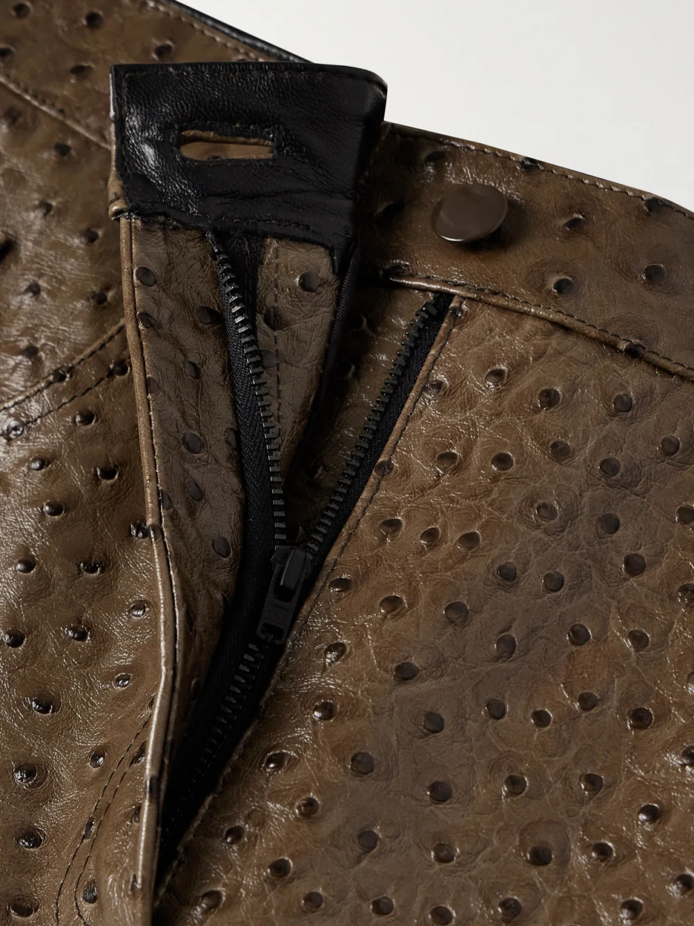 Close-up detail of the 16Arlington Vante Ostrich-effect Leather Straight-leg Pants