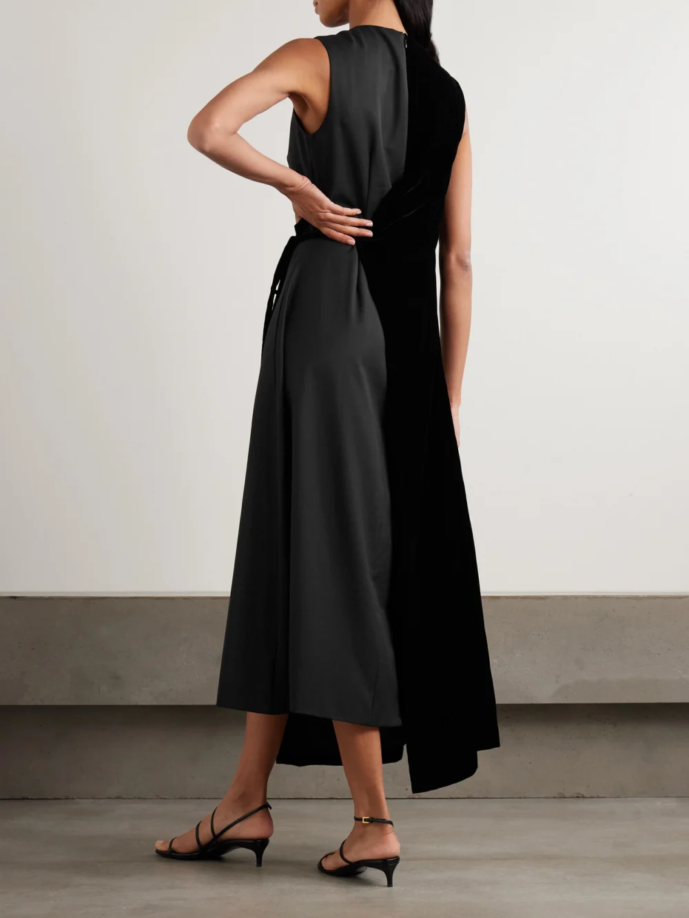 Back view of the Abadia Asymmetric Velvet and Wool-blend Twill Wrap Midi Dress