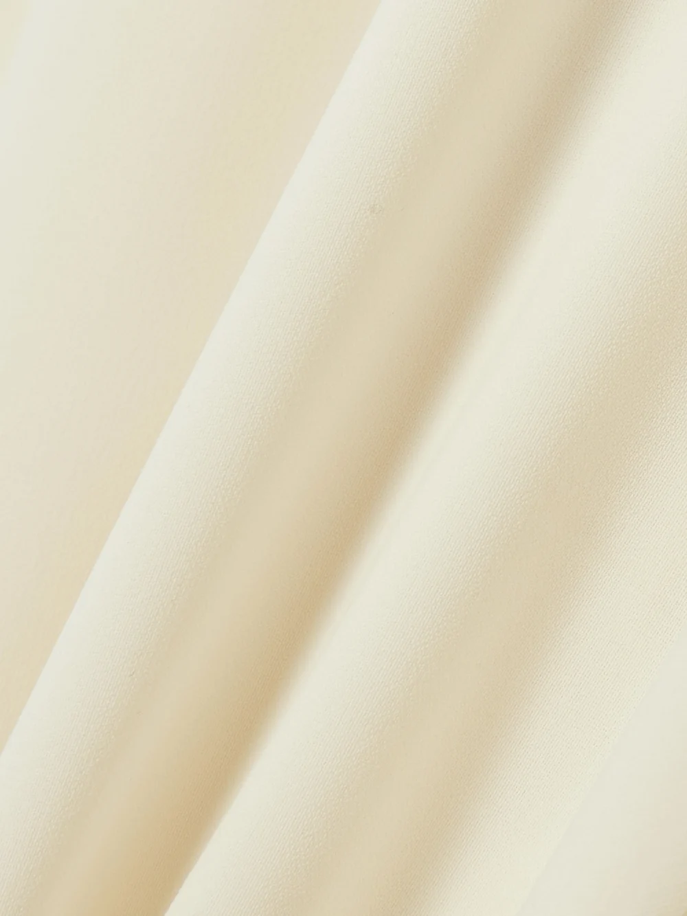 Close-up detail of the Abadia Crepe Straight-leg Pants