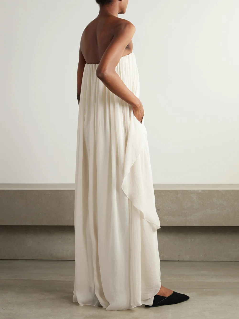 Back view of the Abadia Liya Strapless Cape-effect Chiffon-trimmed Poplin Jumpsuit