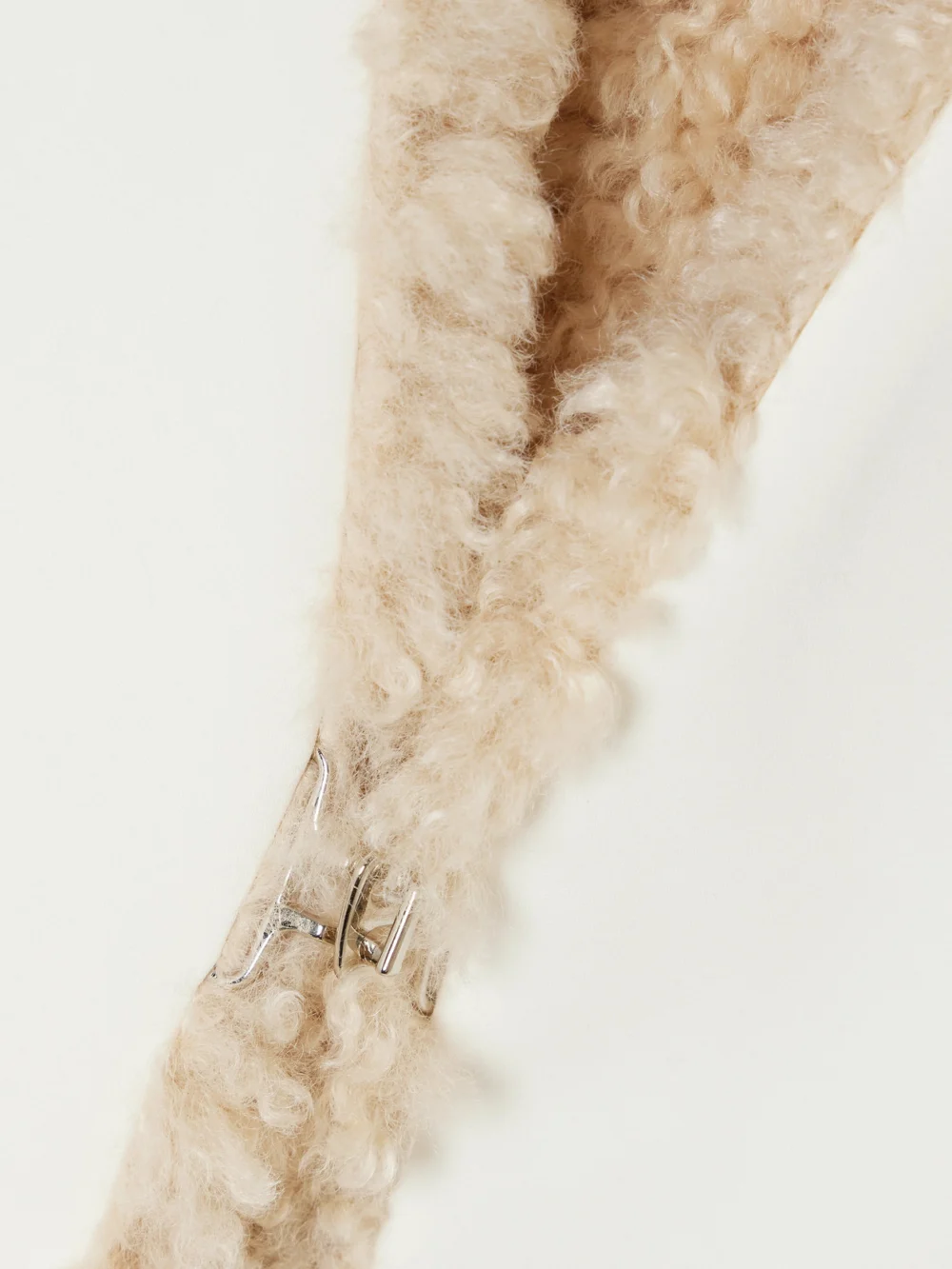 Close-up detail of the Abadia Naila Faux Shearling-lined Embellished Cotton-blend Coat