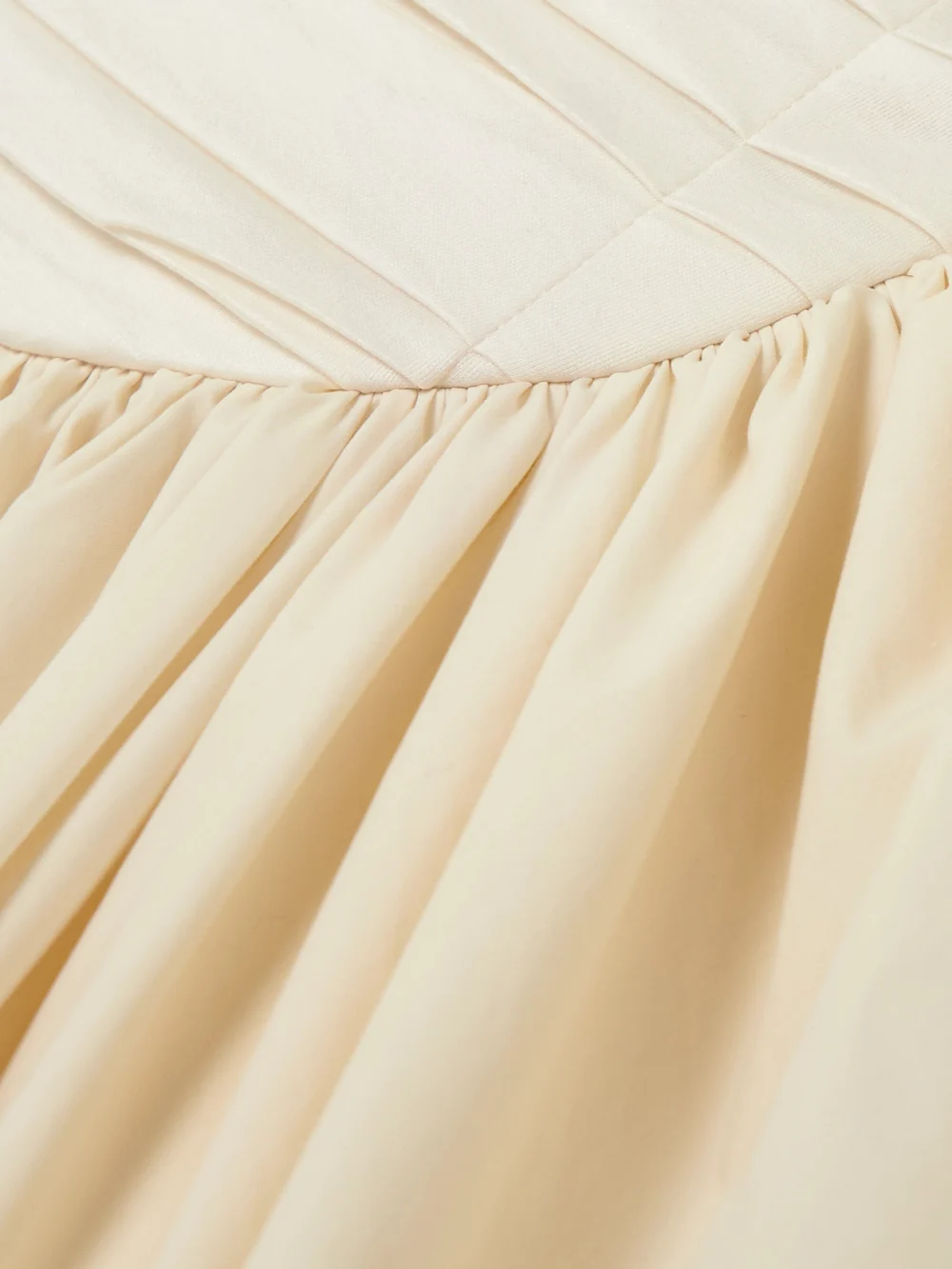 Close-up detail of the Abadia Ora Gathered Tencel™ Lyocell and Cotton-blend Poplin and Jersey Midi Dress