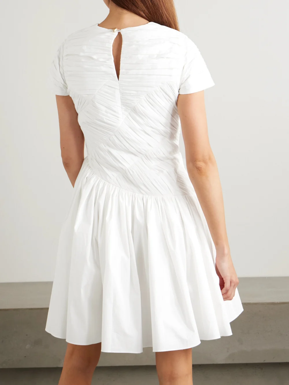Back view of the Abadia Paloma Gathered Cotton-blend Poplin Mini Dress