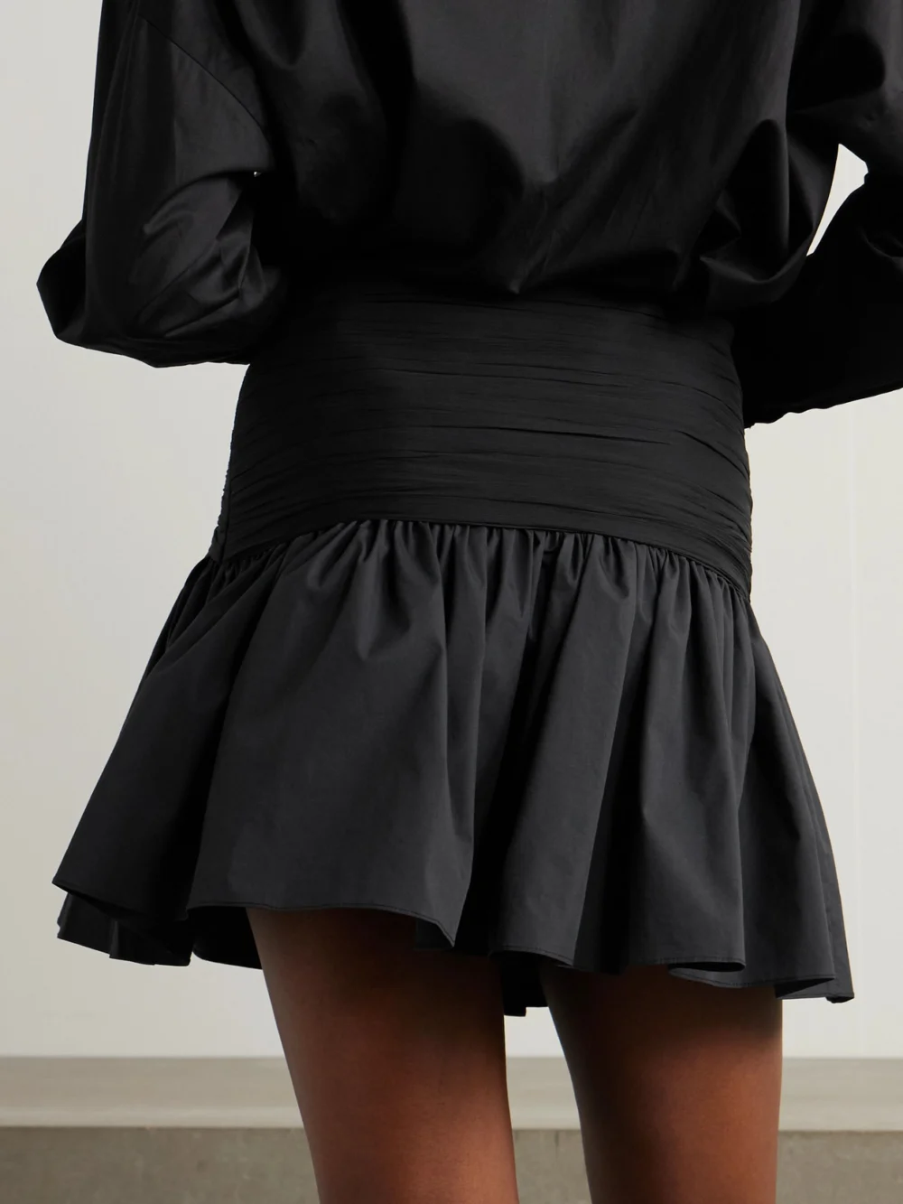 Back view of the Abadia Ruched Chiffon-trimmed Poplin Mini Skirt