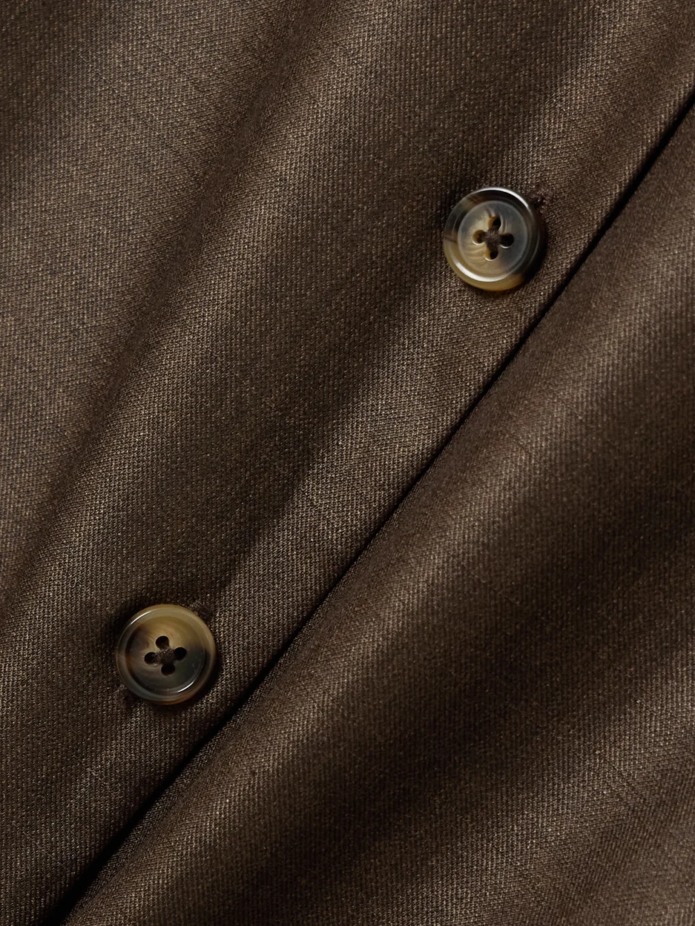 Close-up detail of the Abadia Woven Vest