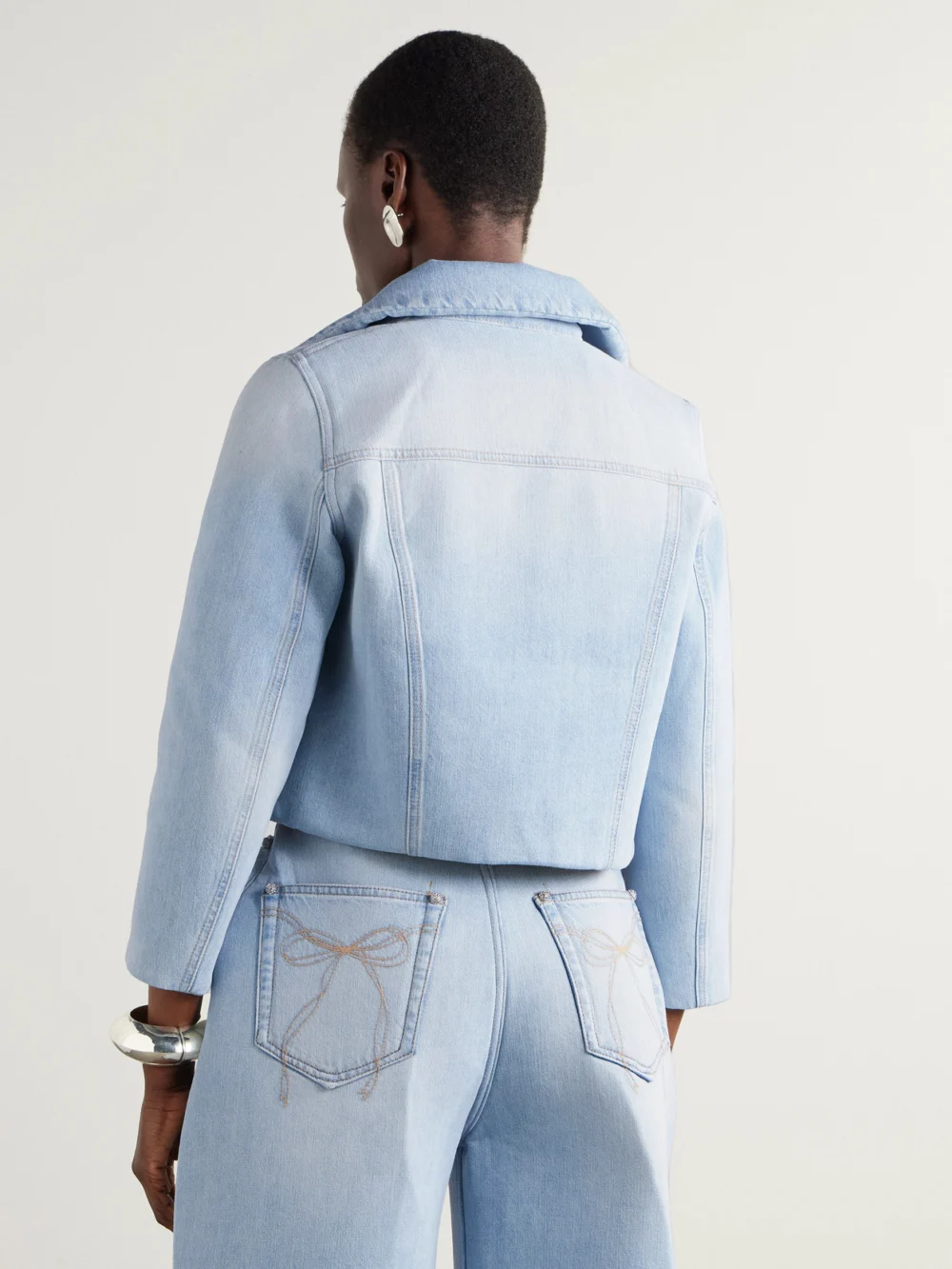 Back view of the Acne Studios Cropped Denim Jacket