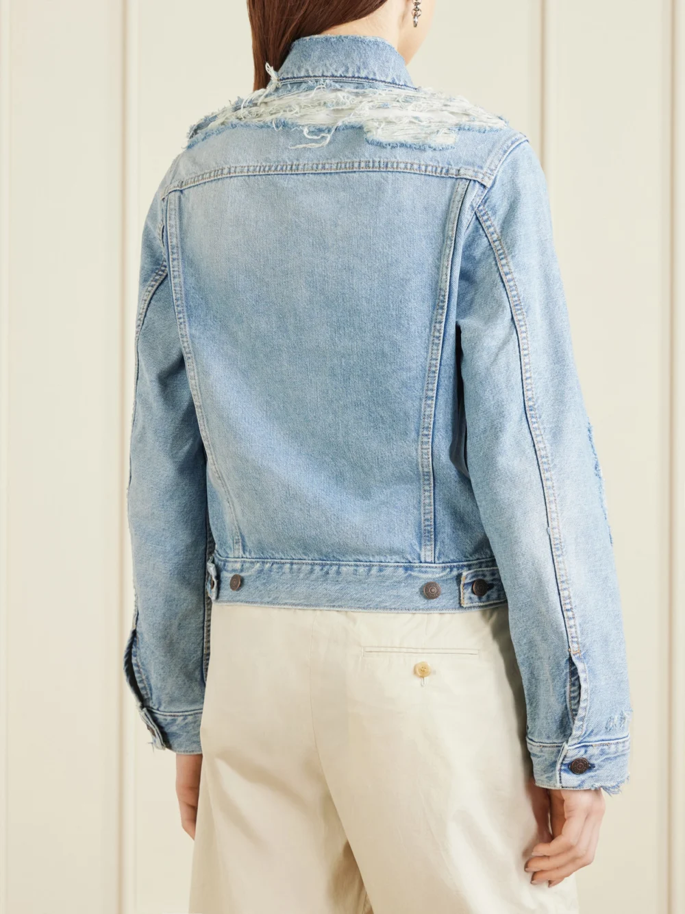 Back view of the Acne Studios Distressed Organic Denim Jacket