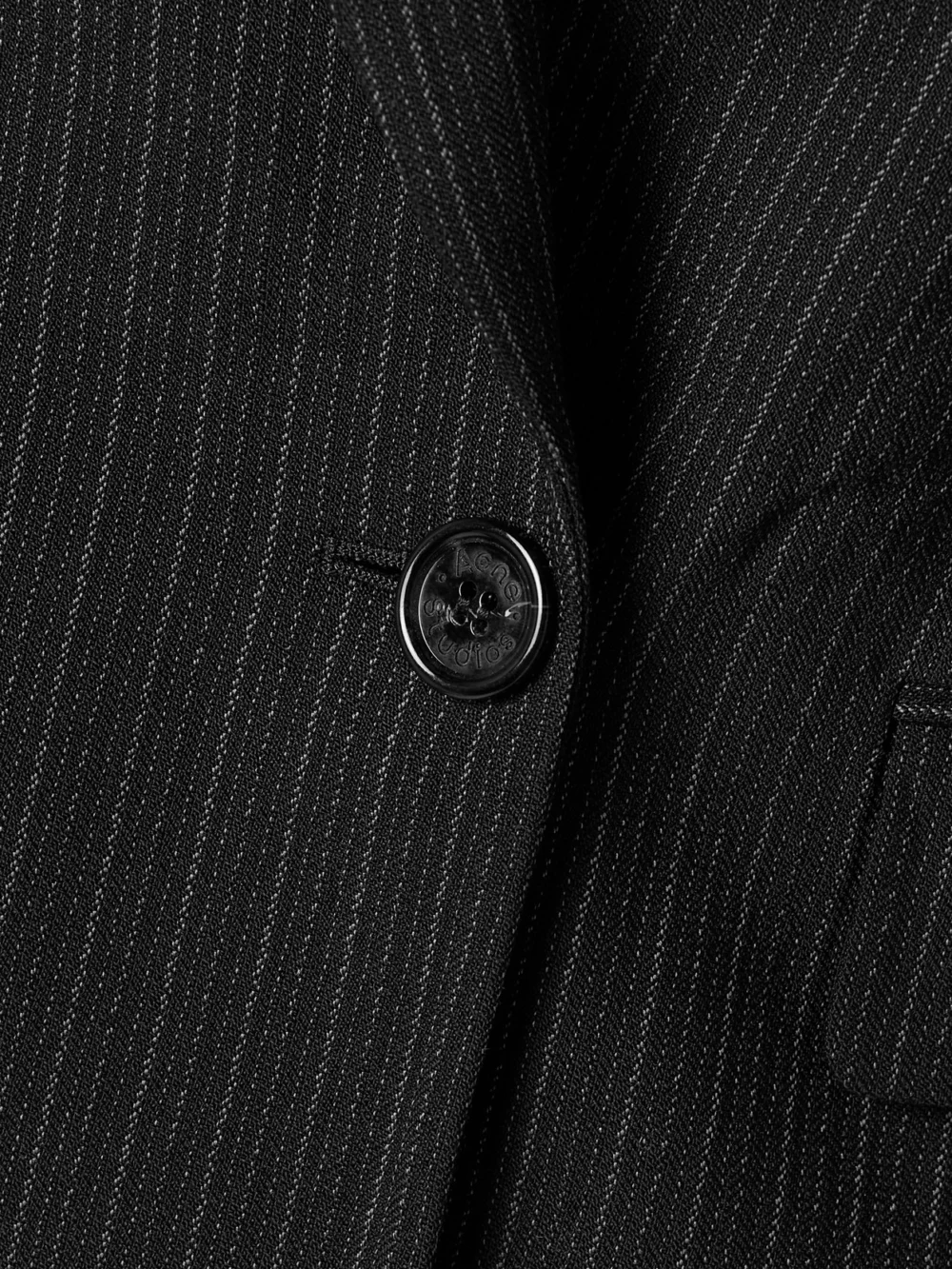 Close-up detail of the Acne Studios Double-breasted Pinstriped Wool and Cotton-blend Blazer