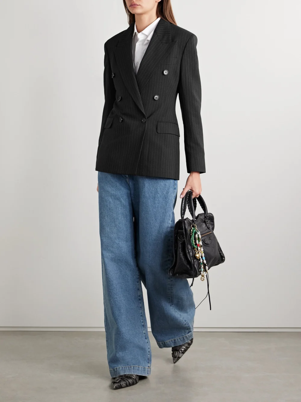 Acne Studios Double-breasted Pinstriped Wool and Cotton-blend Blazer, worn by a model