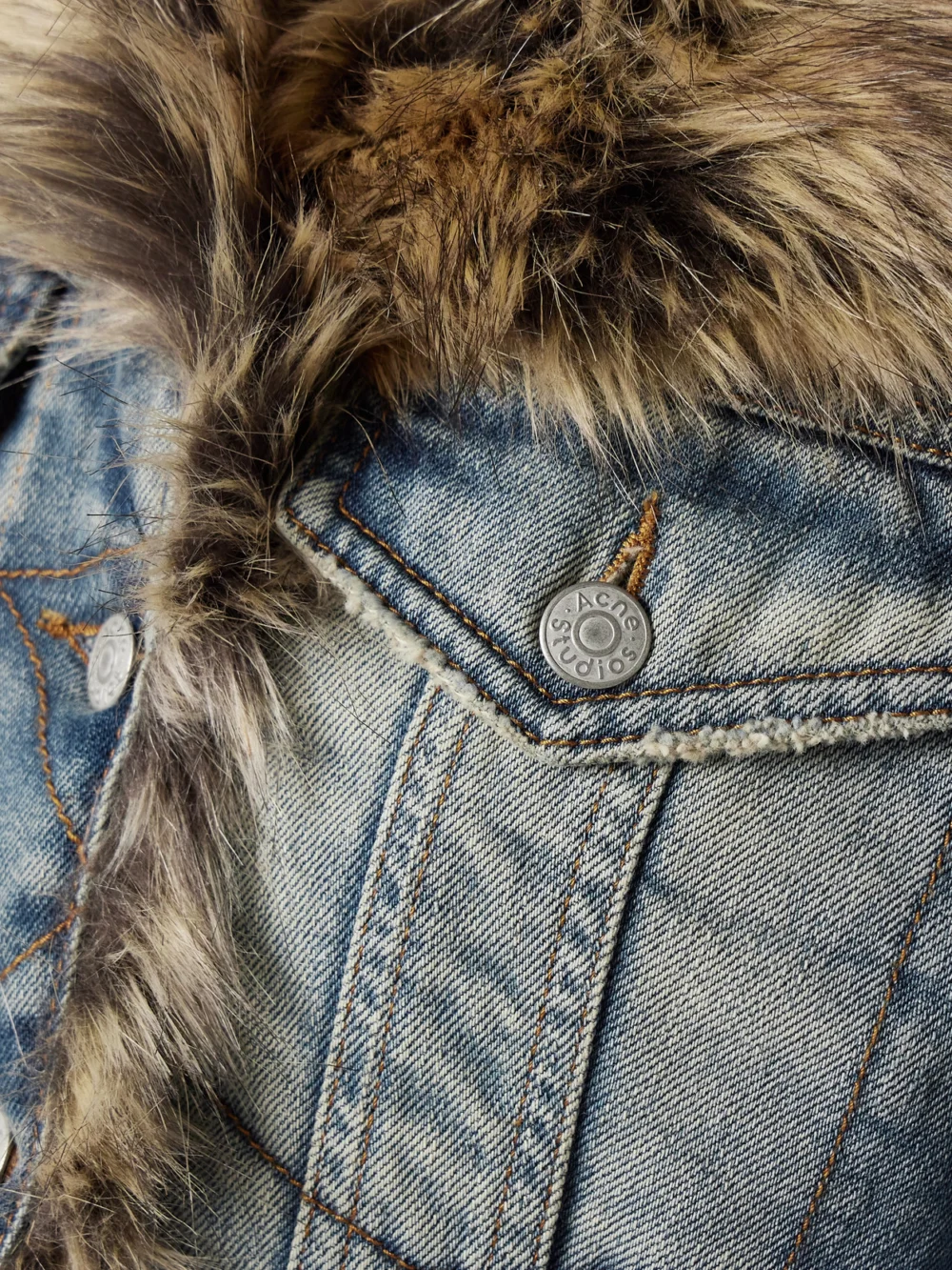 Close-up detail of the Acne Studios Faux Fur-trimmed Denim Jacket