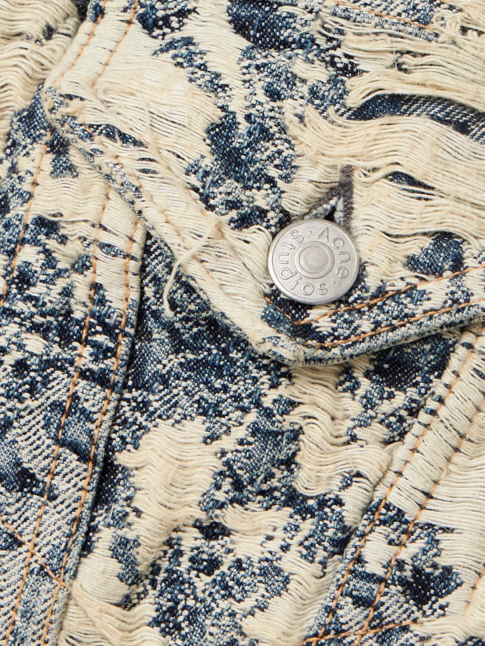 Close-up detail of the Acne Studios Hooded Distressed Organic Denim-jacquard Jacket