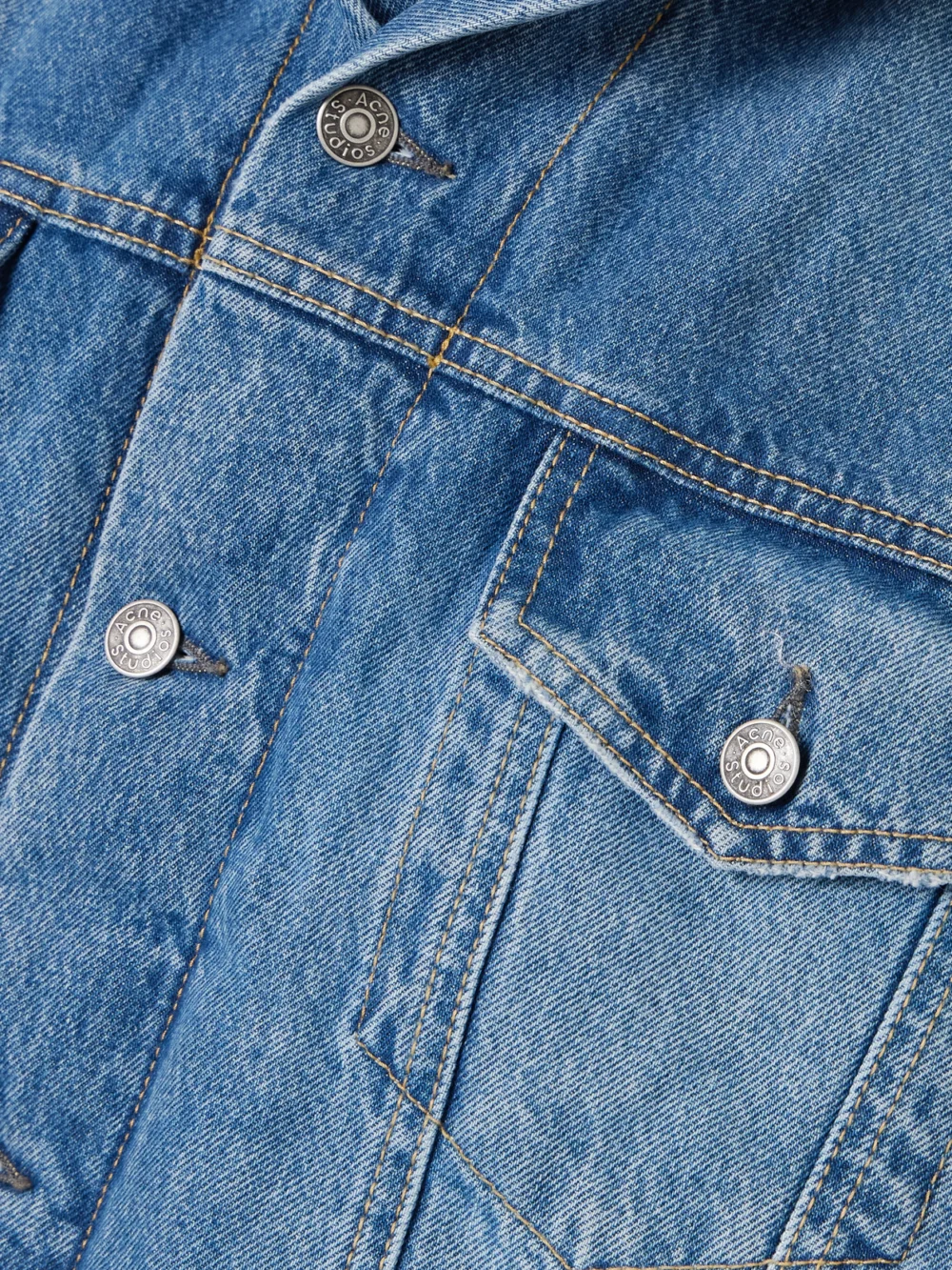 Close-up detail of the Acne Studios Robert Plush-trimmed Padded Denim Jacket